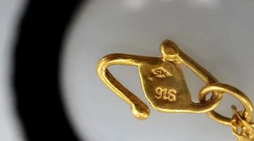 916-gold-stamp.webp