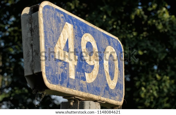 dirty-blue-kilometer-sign-road-600w-1148084621.jpg