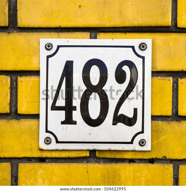 enameled-house-number-four-hundred-600w-104622995.jpg